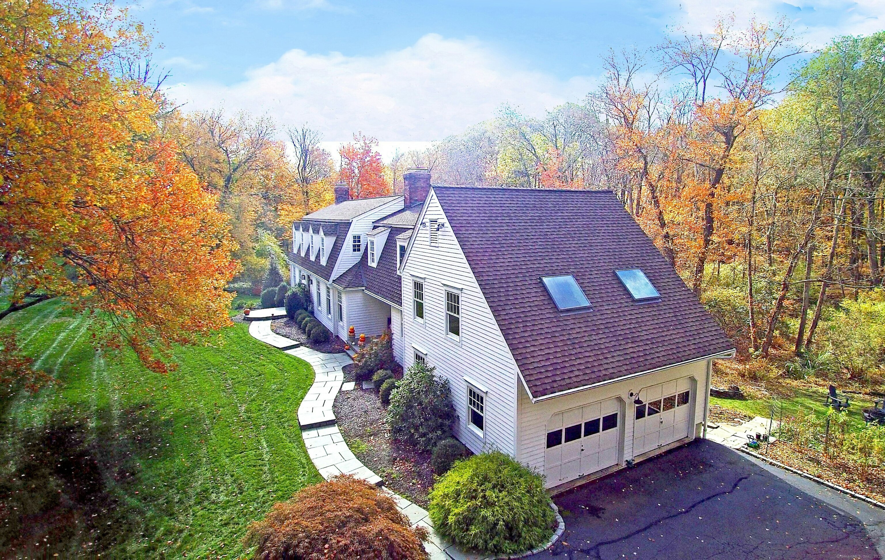 112 Middlebrook Farm Road Wilton, CT 06897 - Photo 39 of 40 a aerial view of a house with a yard