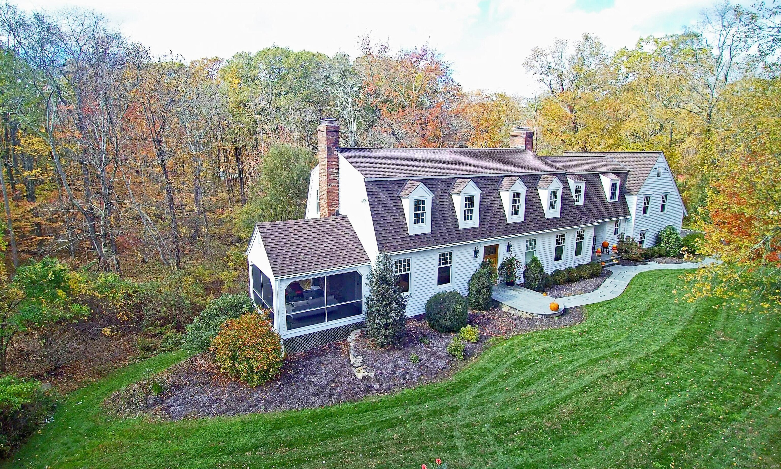 112 Middlebrook Farm Road Wilton, CT 06897 - Photo 9 of 40 a view of a house with a yard