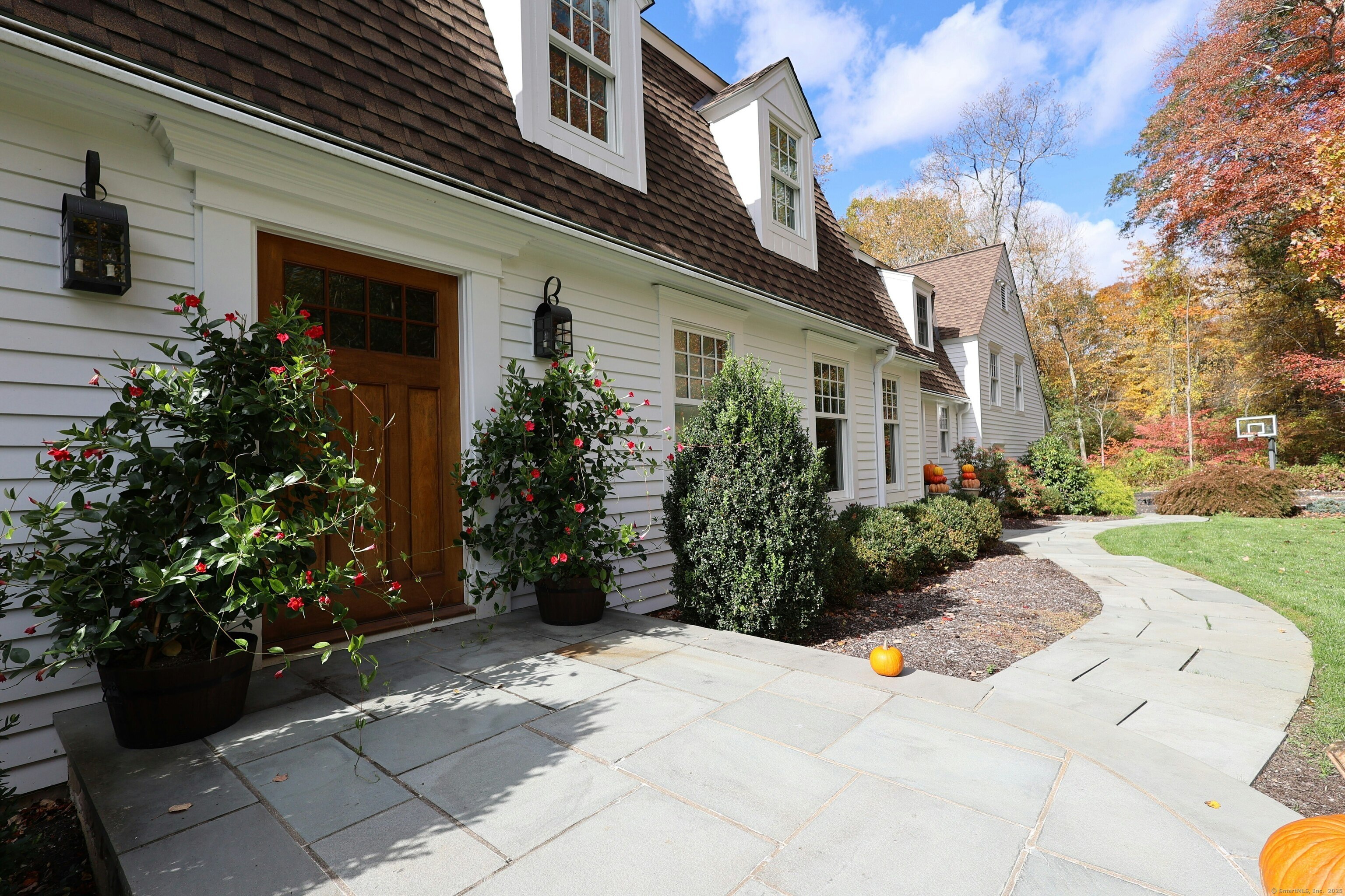 112 Middlebrook Farm Road Wilton, CT 06897 - Photo 10 of 40 a view of a house with backyard and garden