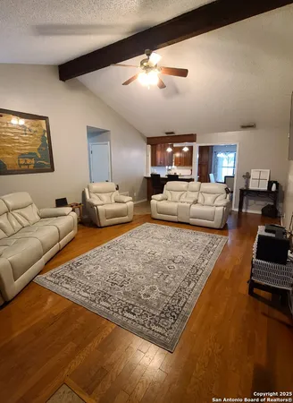 a living room with furniture and a couch