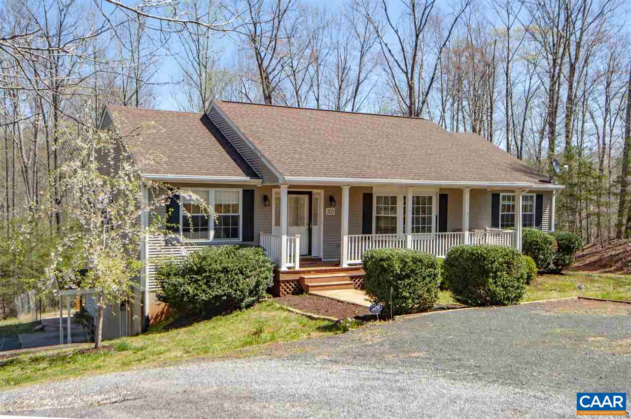 203 Quail Run Amherst, VA 24521 - Photo 1 of 45 a front view of a house with a yard and potted plants