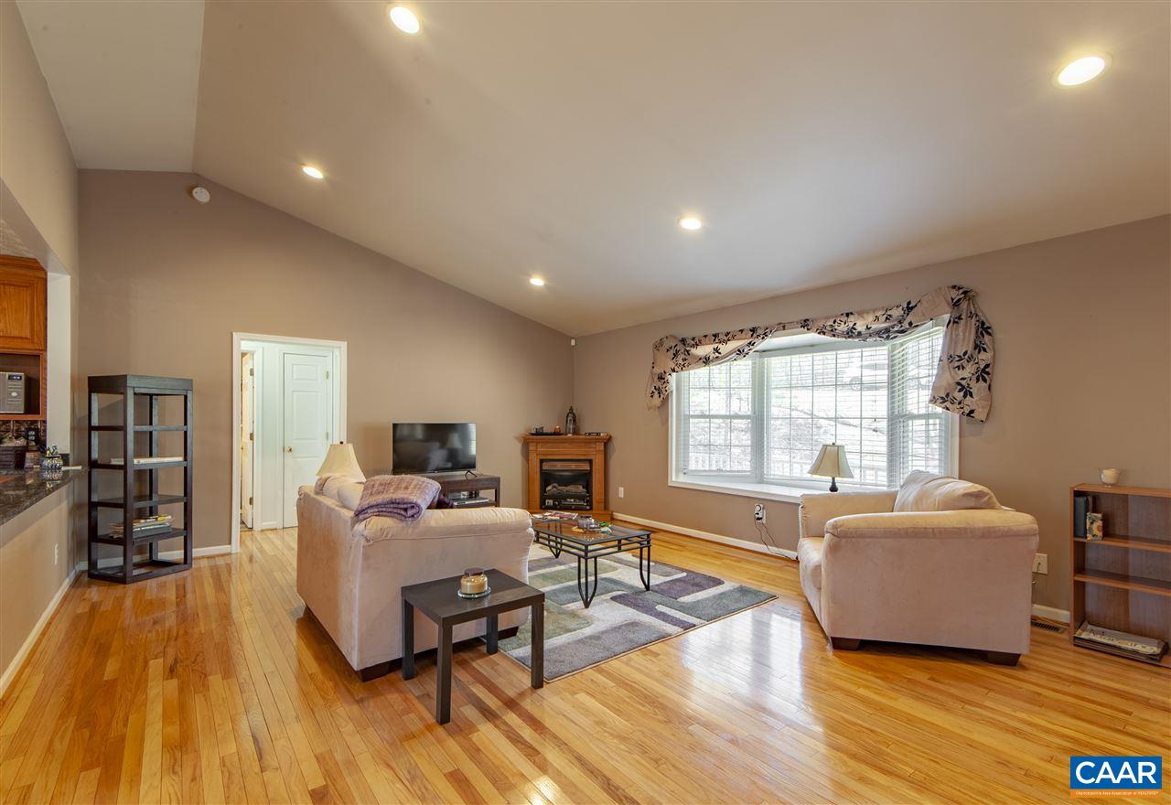 203 Quail Run Amherst, VA 24521 - Photo 11 of 45 a living room with furniture and a wooden floor
