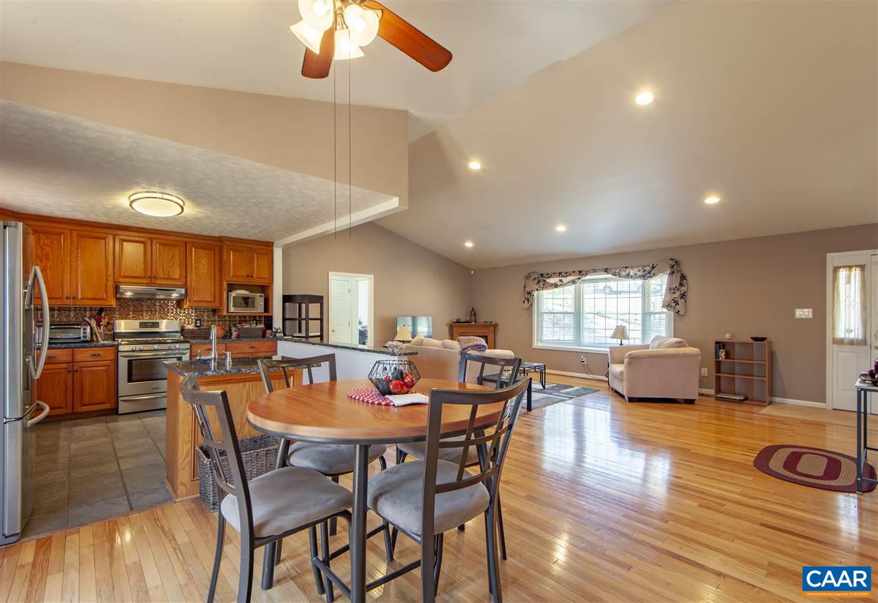 203 Quail Run Amherst, VA 24521 - Photo 14 of 45 a view of a dining room with furniture and wooden floor
