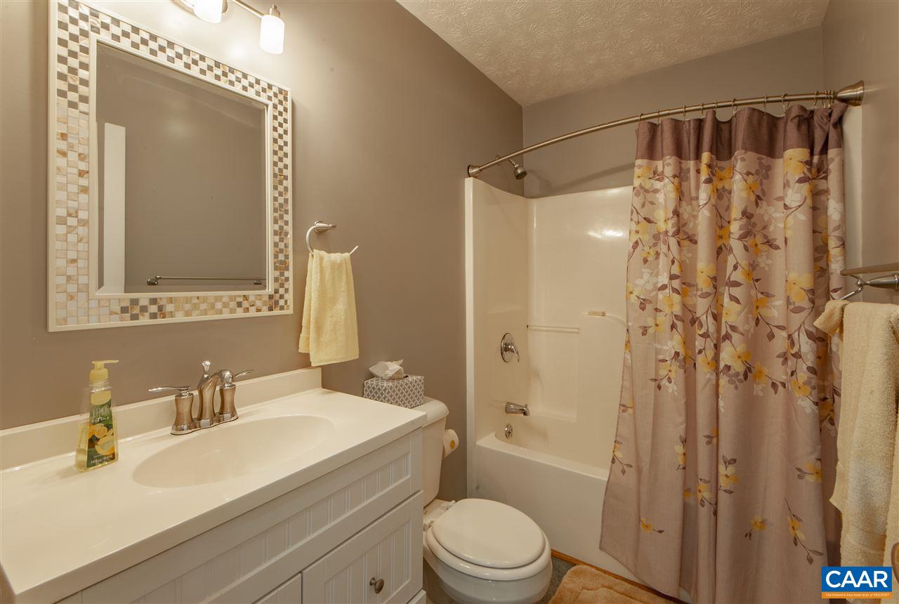 203 Quail Run Amherst, VA 24521 - Photo 25 of 45 a bathroom with a sink a toilet and shower
