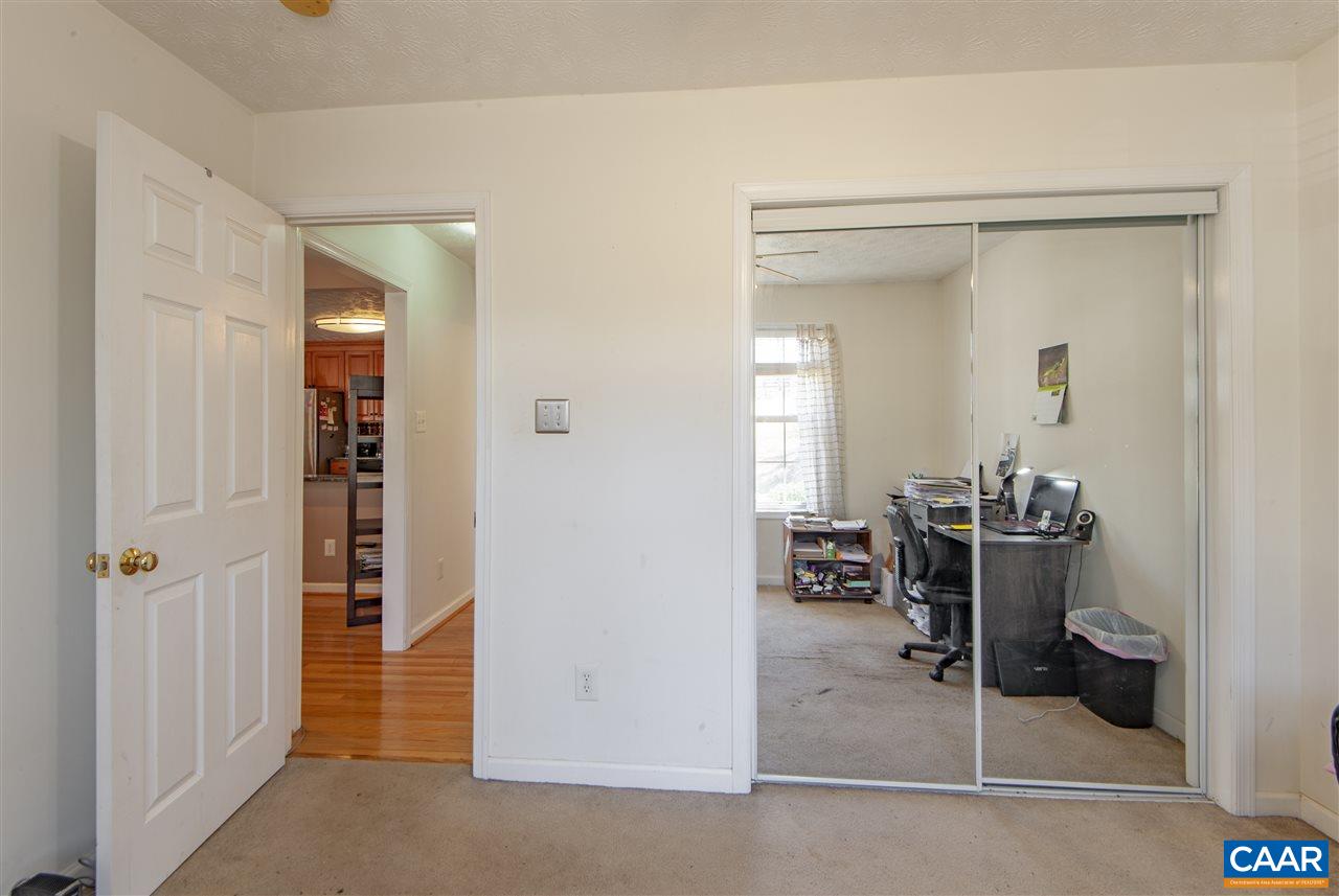 203 Quail Run Amherst, VA 24521 - Photo 26 of 45 wooden floor and view of utility room