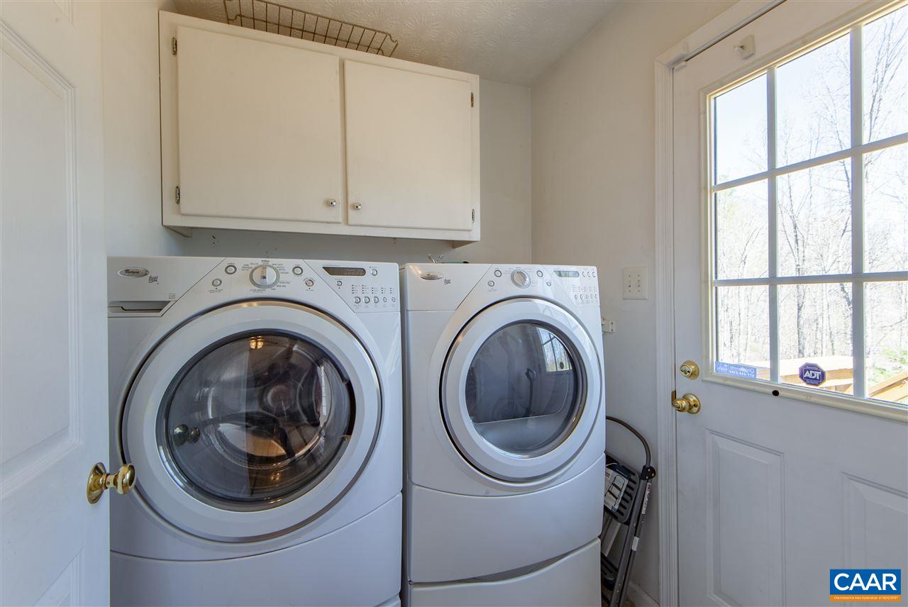 203 Quail Run Amherst, VA 24521 - Photo 27 of 45 a close view of a utility room with dryer and washer