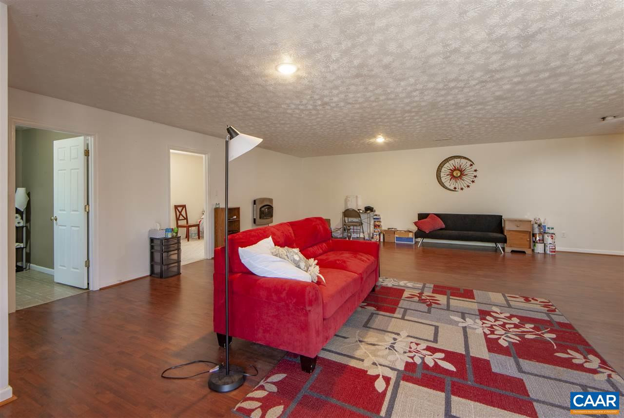 203 Quail Run Amherst, VA 24521 - Photo 32 of 45 a living room with furniture and wooden floor