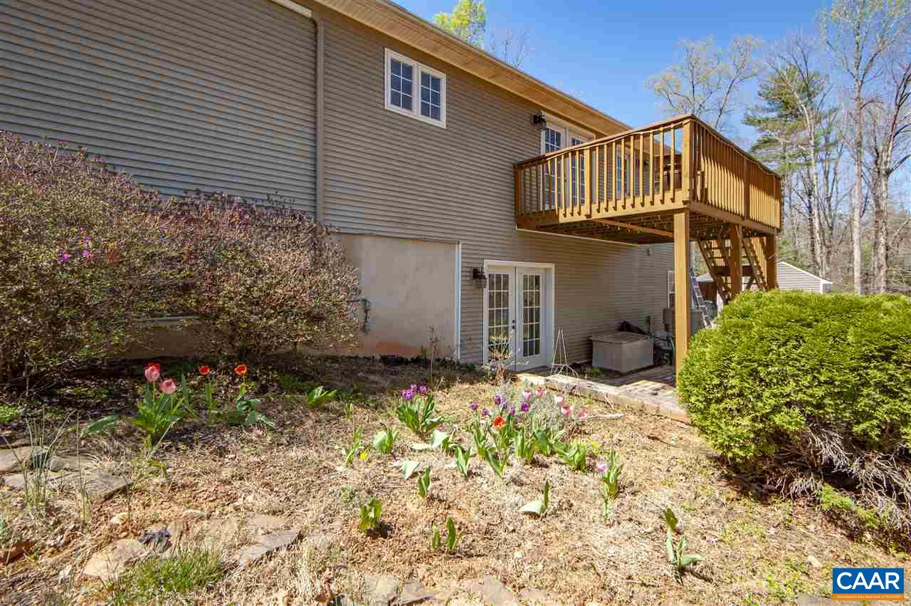 203 Quail Run Amherst, VA 24521 - Photo 4 of 45 a view of a house with a yard and garden