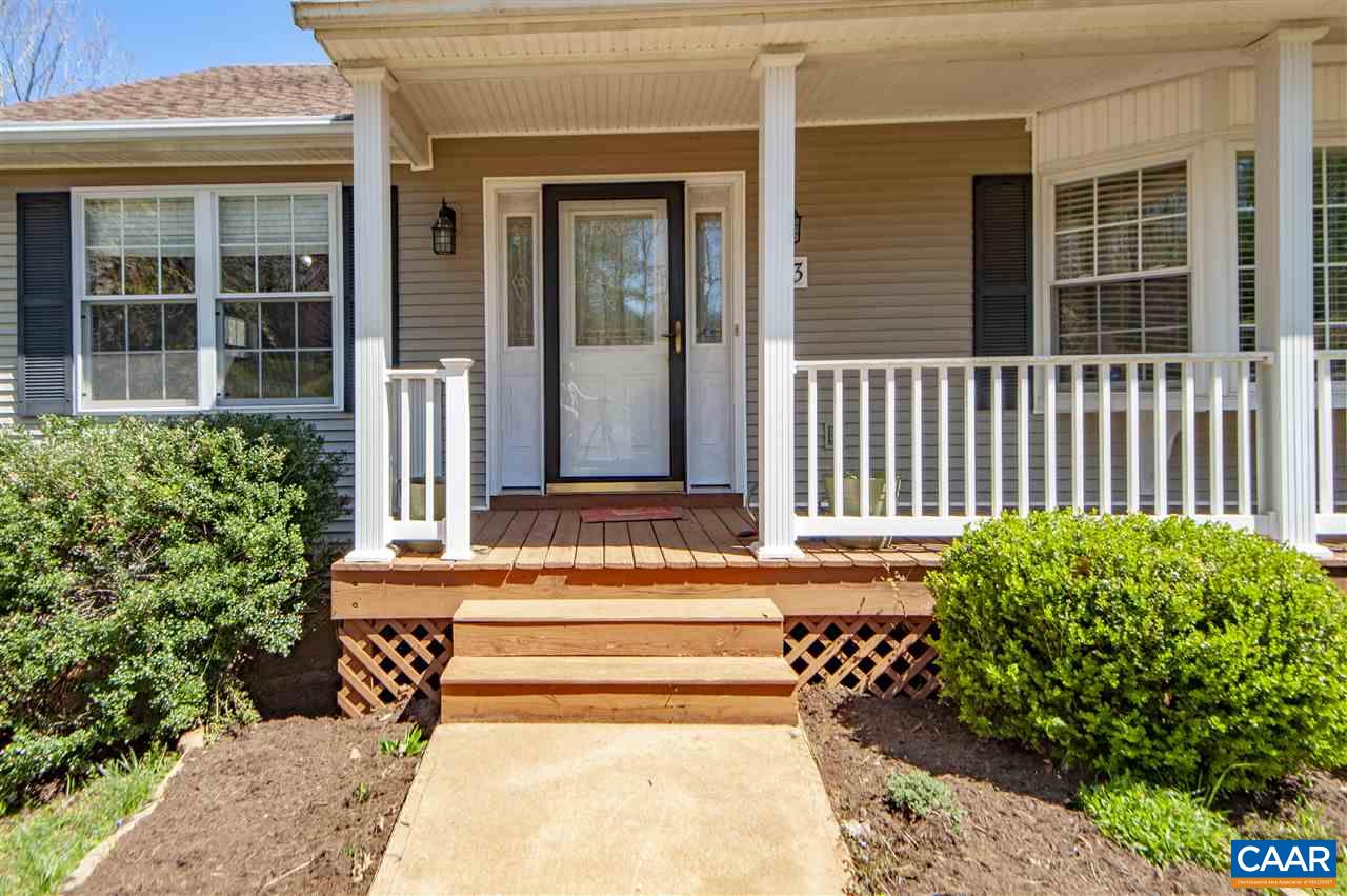 203 Quail Run Amherst, VA 24521 - Photo 6 of 45 a view of a house with a small yard and flower plants