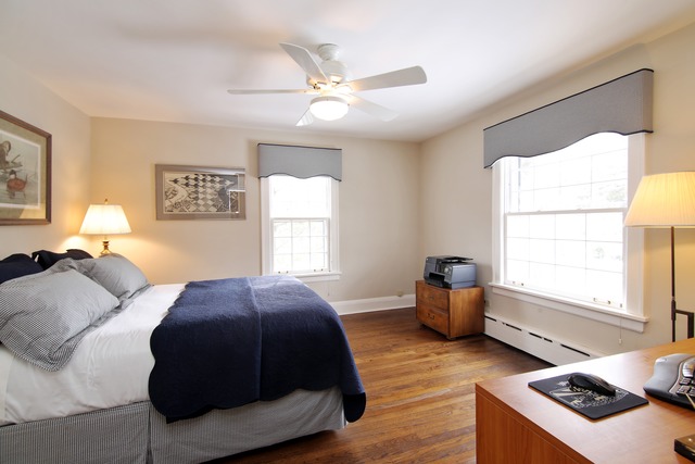 233 Ridge Avenue Winnetka, IL 60093 - Photo 14 of 25 a bed room with two beds and a window