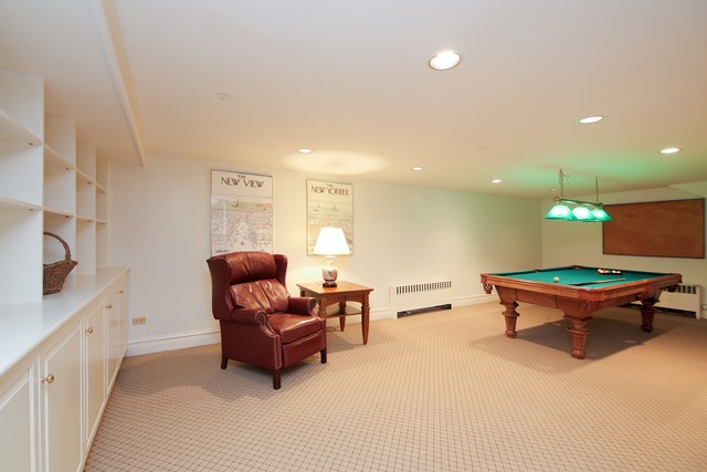 233 Ridge Avenue Winnetka, IL 60093 - Photo 21 of 25 a living room with furniture and a couch