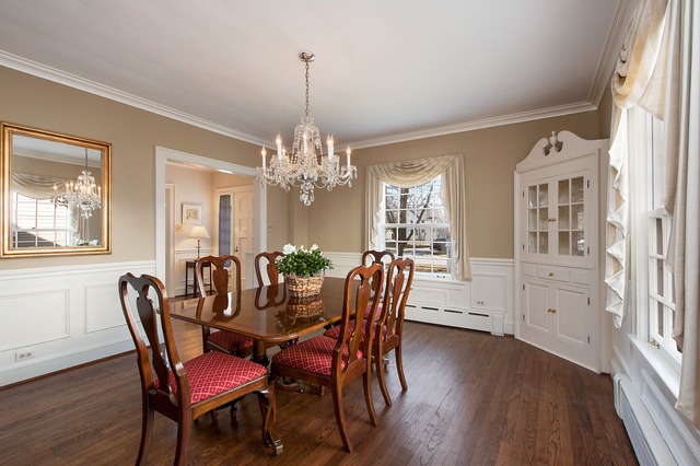 233 Ridge Avenue Winnetka, IL 60093 - Photo 6 of 25 a view of a dining room with furniture a chandelier and wooden floor