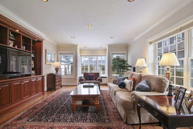 233 Ridge Avenue Winnetka, IL 60093 - Photo 9 of 25 a living room with furniture large window and a table