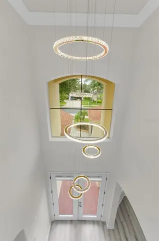 a living room with furniture or couch and a potted plant