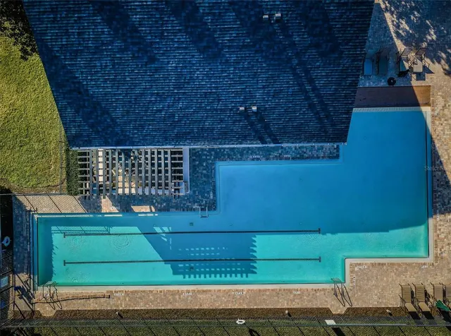 a kitchen with granite countertop a stove and a refrigerator