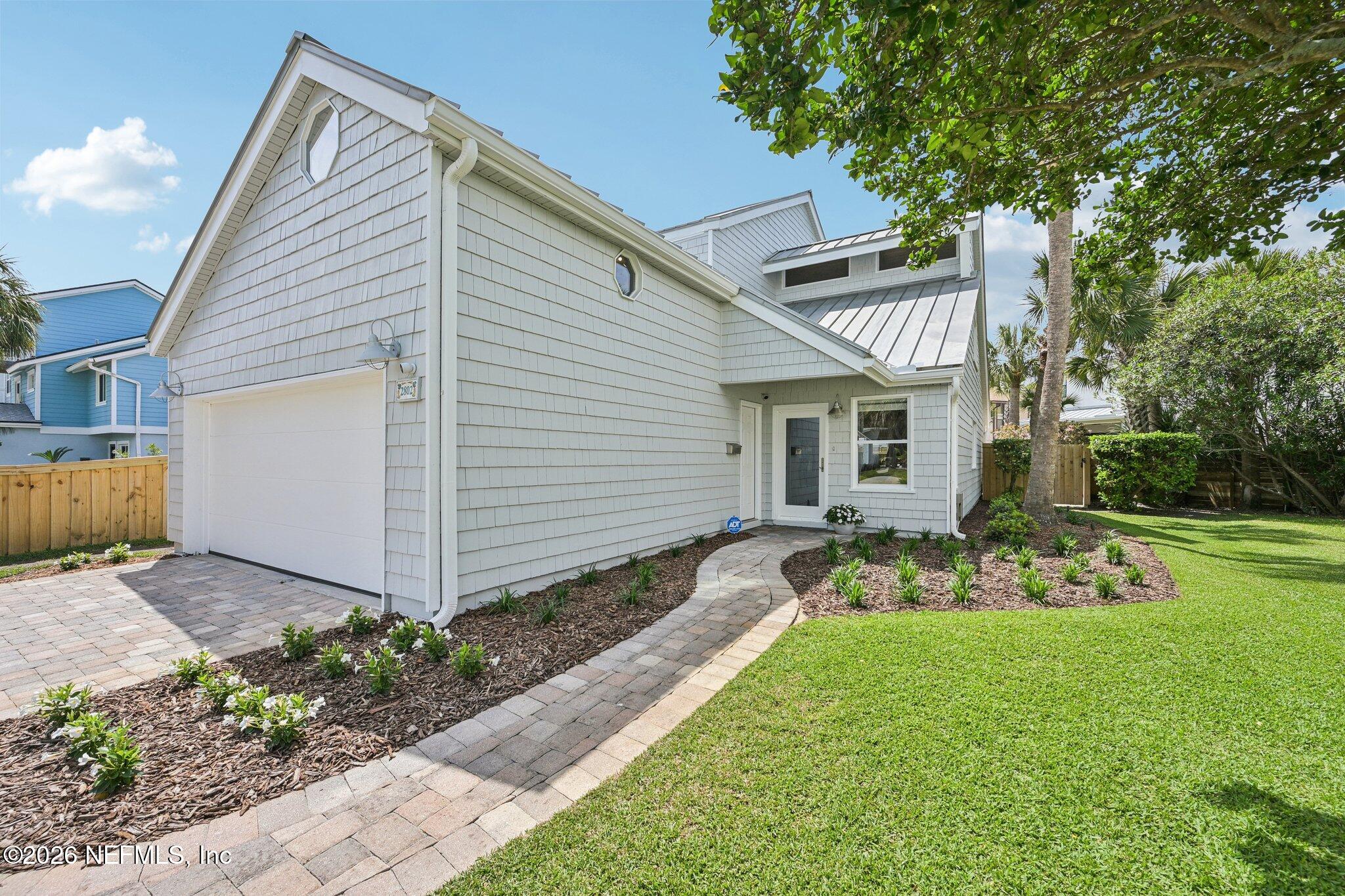 2802 2nd Street South Jacksonville Beach, FL 32250 - Photo 4 of 53 a front view of a house with garden