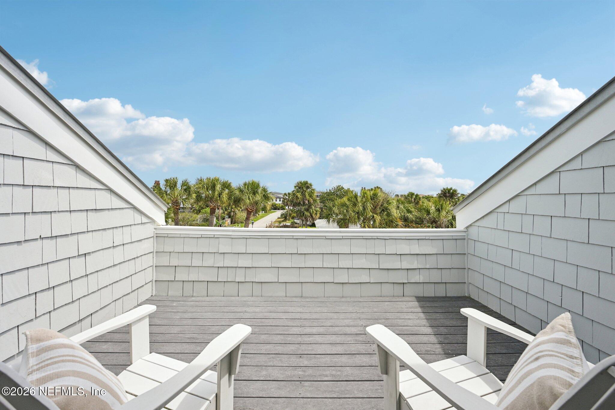 2802 2nd Street South Jacksonville Beach, FL 32250 - Photo 40 of 53 a view of a balcony with chairs