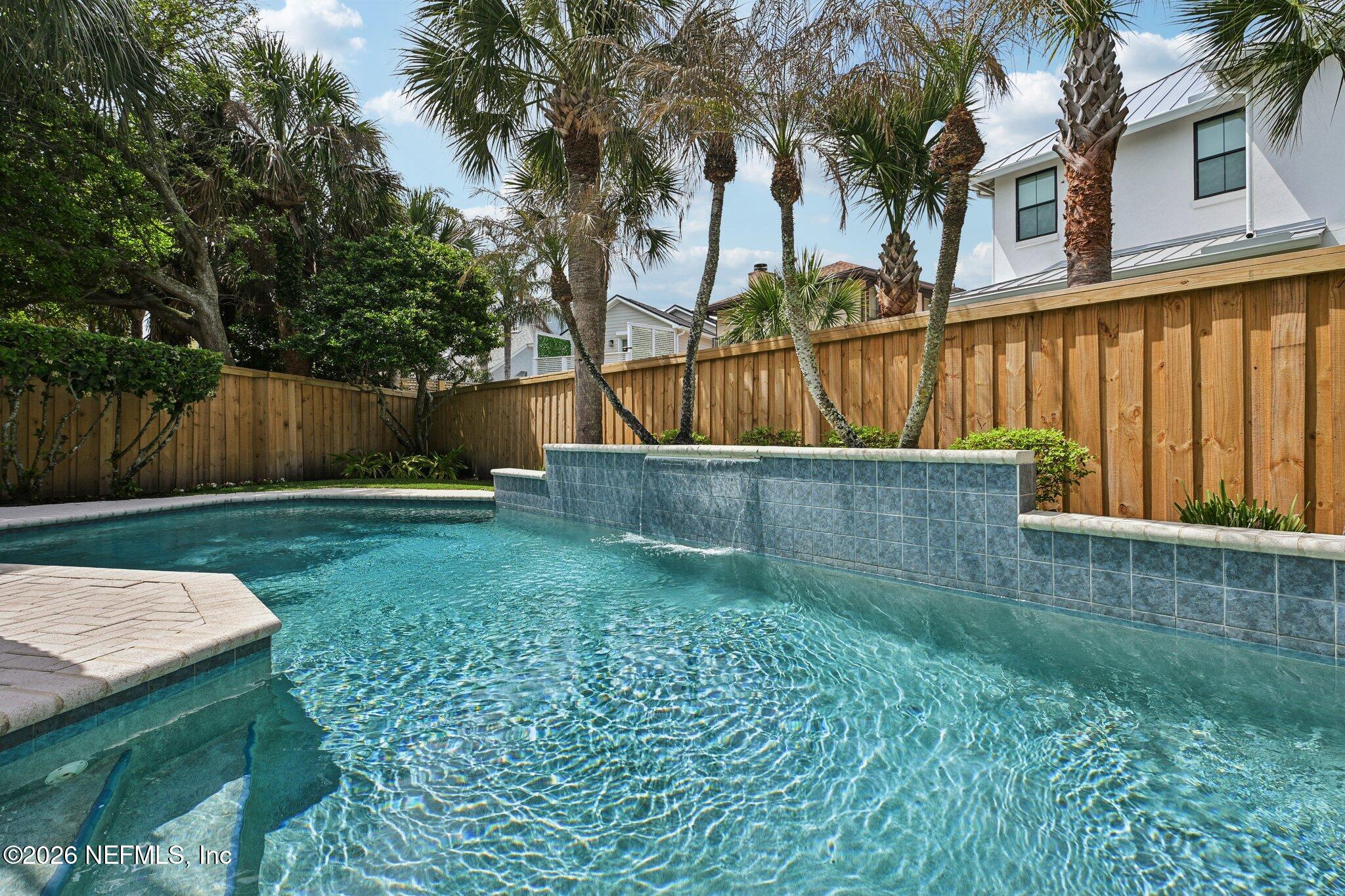 2802 2nd Street South Jacksonville Beach, FL 32250 - Photo 44 of 53 a view of backyard with potted plants and wooden fence
