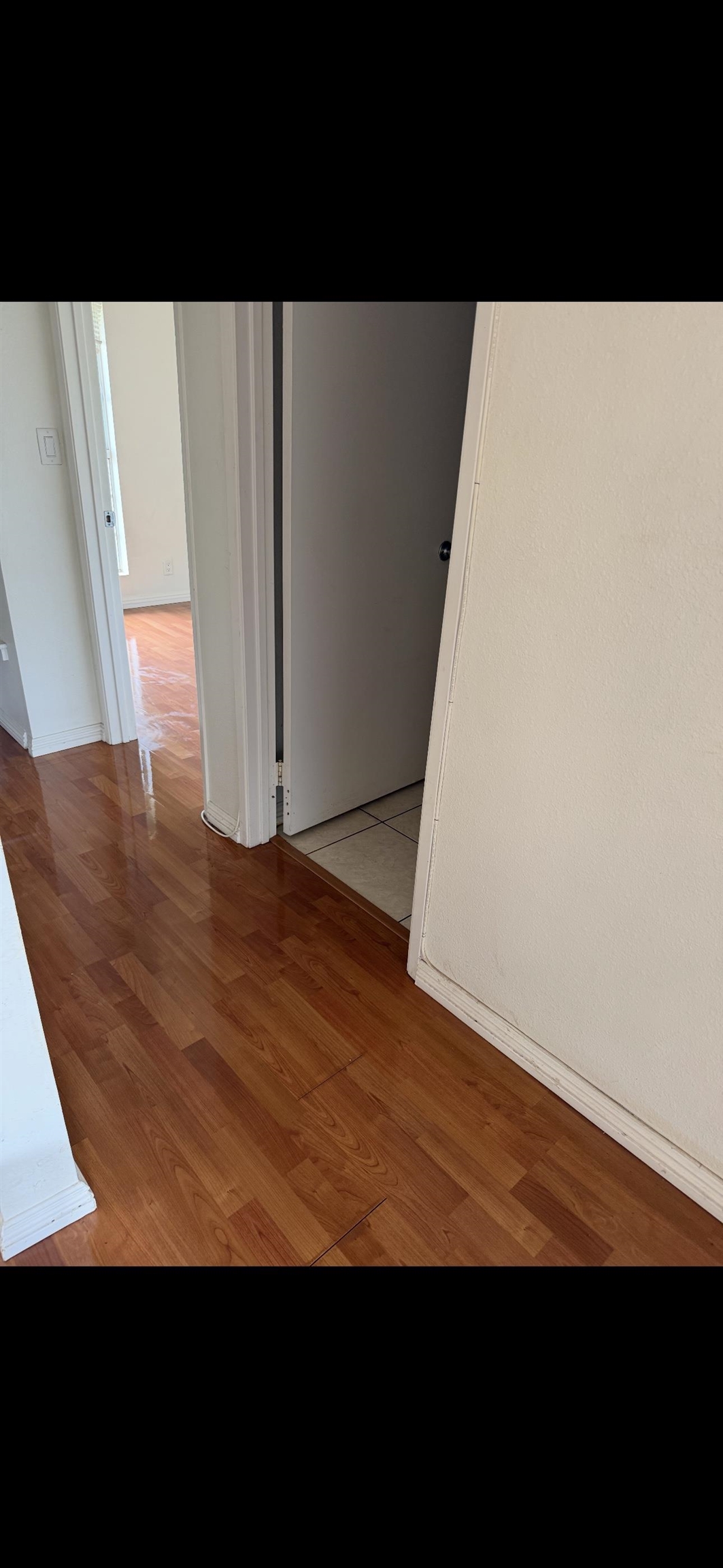 140 Uwapo Road, Unit 35204 Kihei, HI 96753 - Photo 11 of 16 a view of an empty room with wooden floor
