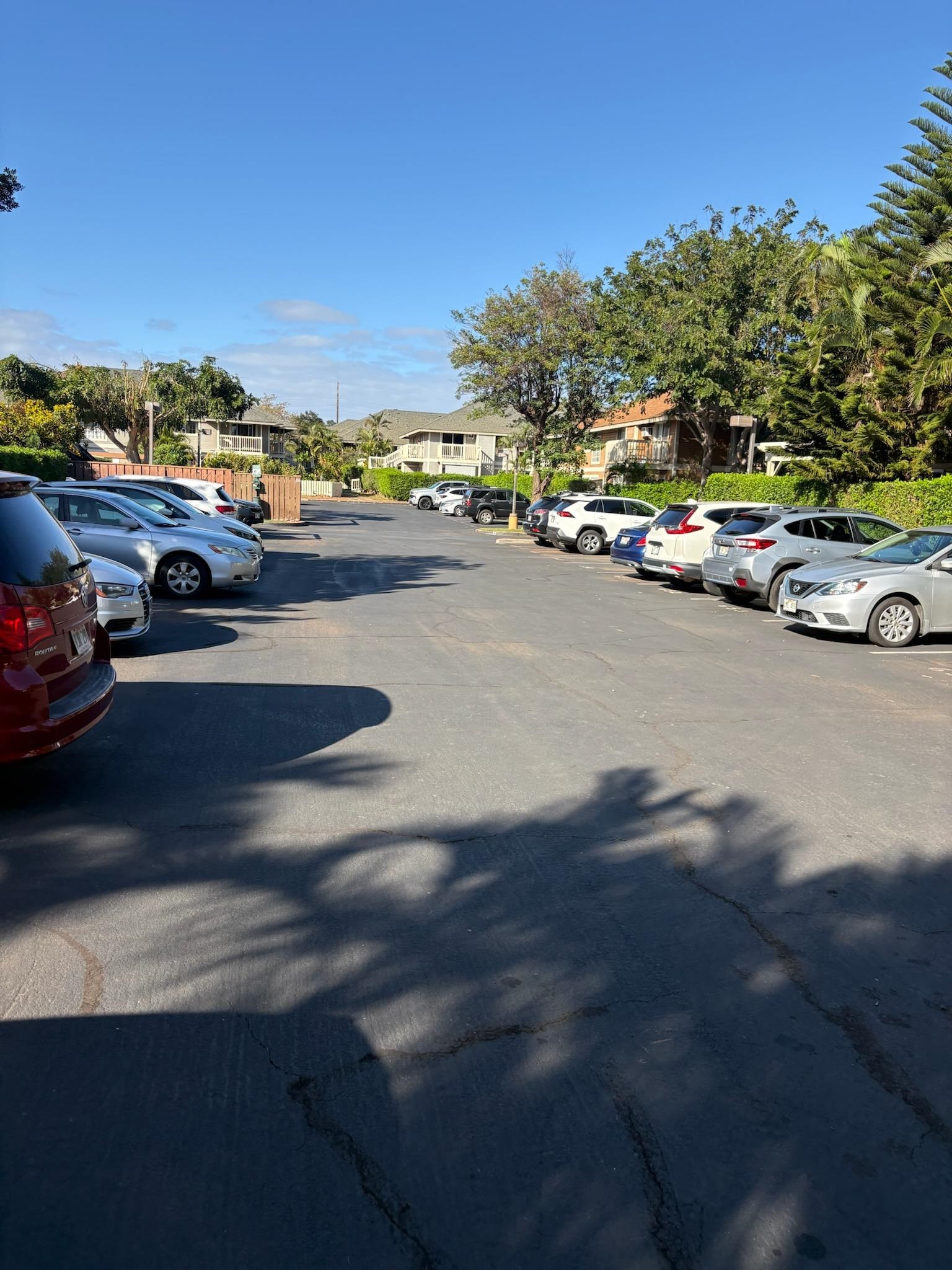 140 Uwapo Road, Unit 35204 Kihei, HI 96753 - Photo 2 of 16 a view of a city street with cars