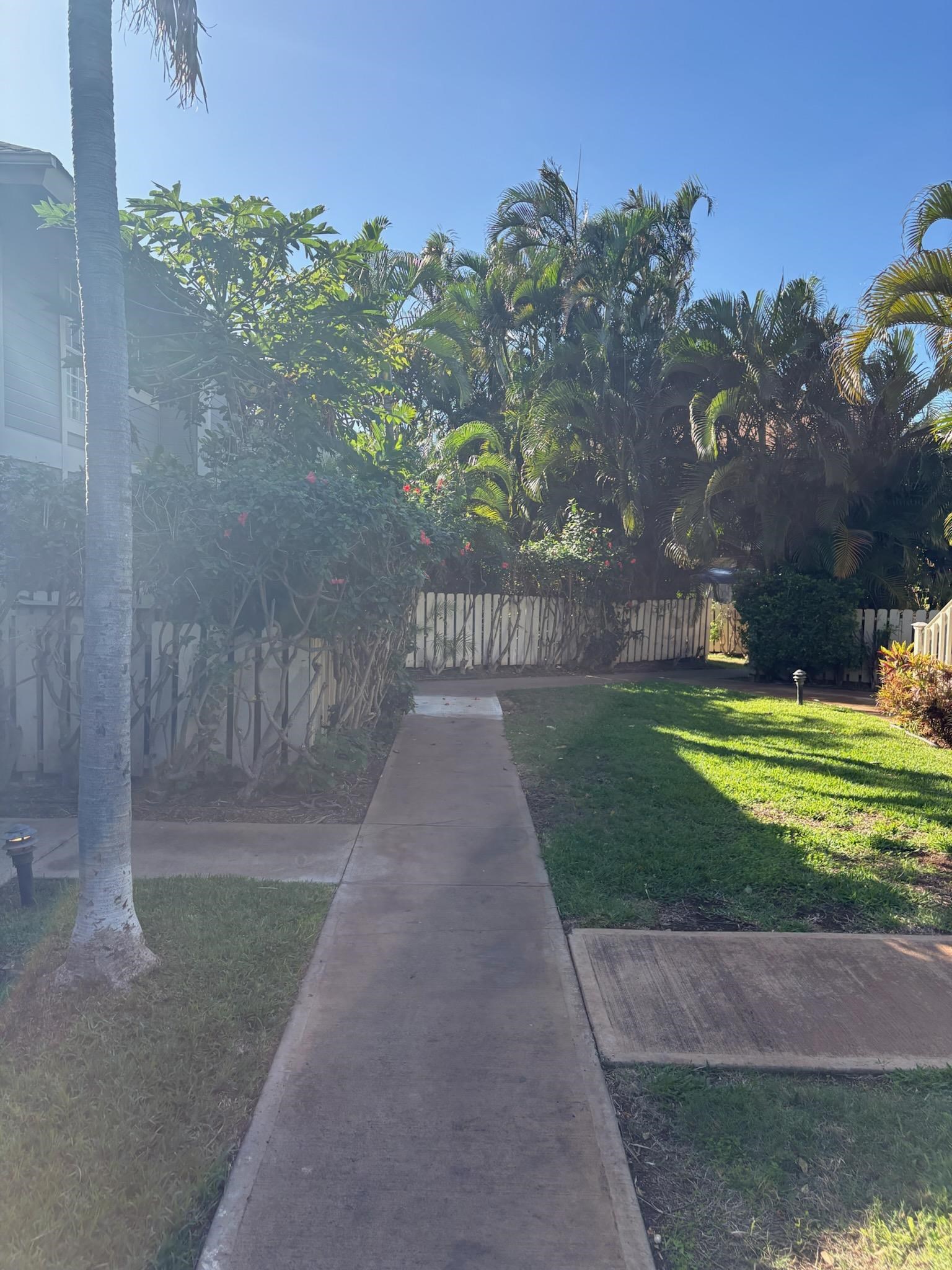 140 Uwapo Road, Unit 35204 Kihei, HI 96753 - Photo 3 of 16 a view of a park with of a house in the background