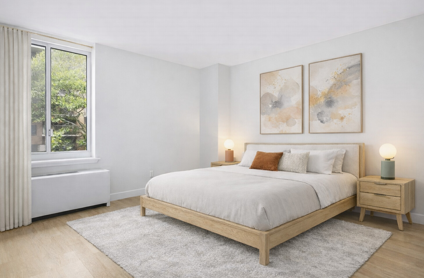 333 Rector Place, Unit 301 Manhattan, NY 10280 - Photo 3 of 8 a bedroom with a bed lamp and a window