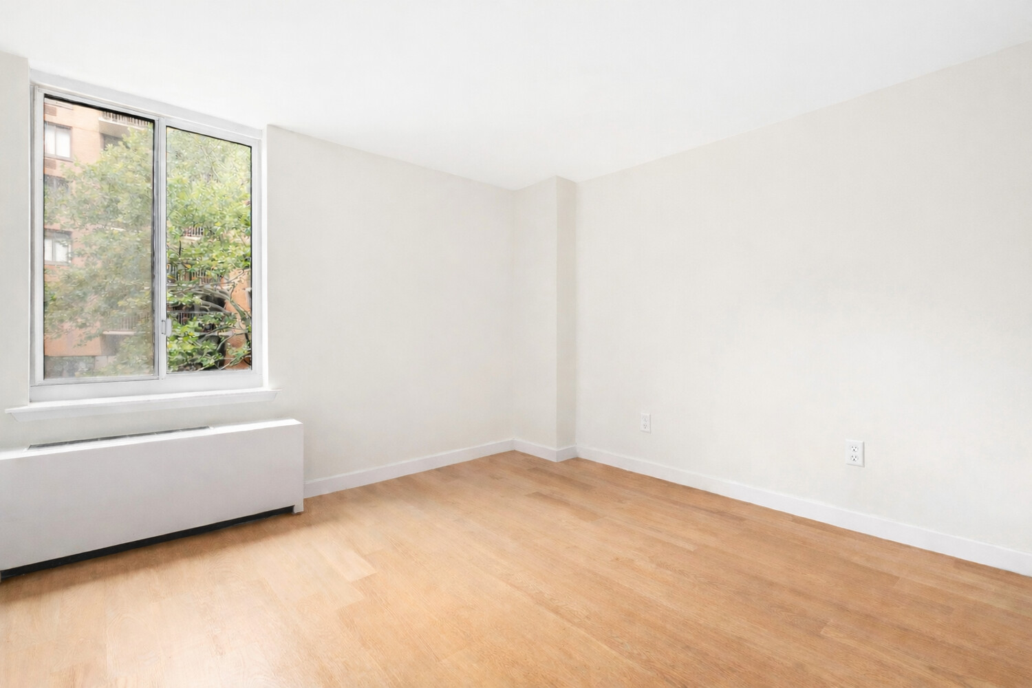 333 Rector Place, Unit 301 Manhattan, NY 10280 - Photo 4 of 8 a view of an empty room with a window
