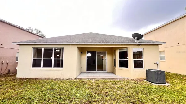a front view of a house with glass windows
