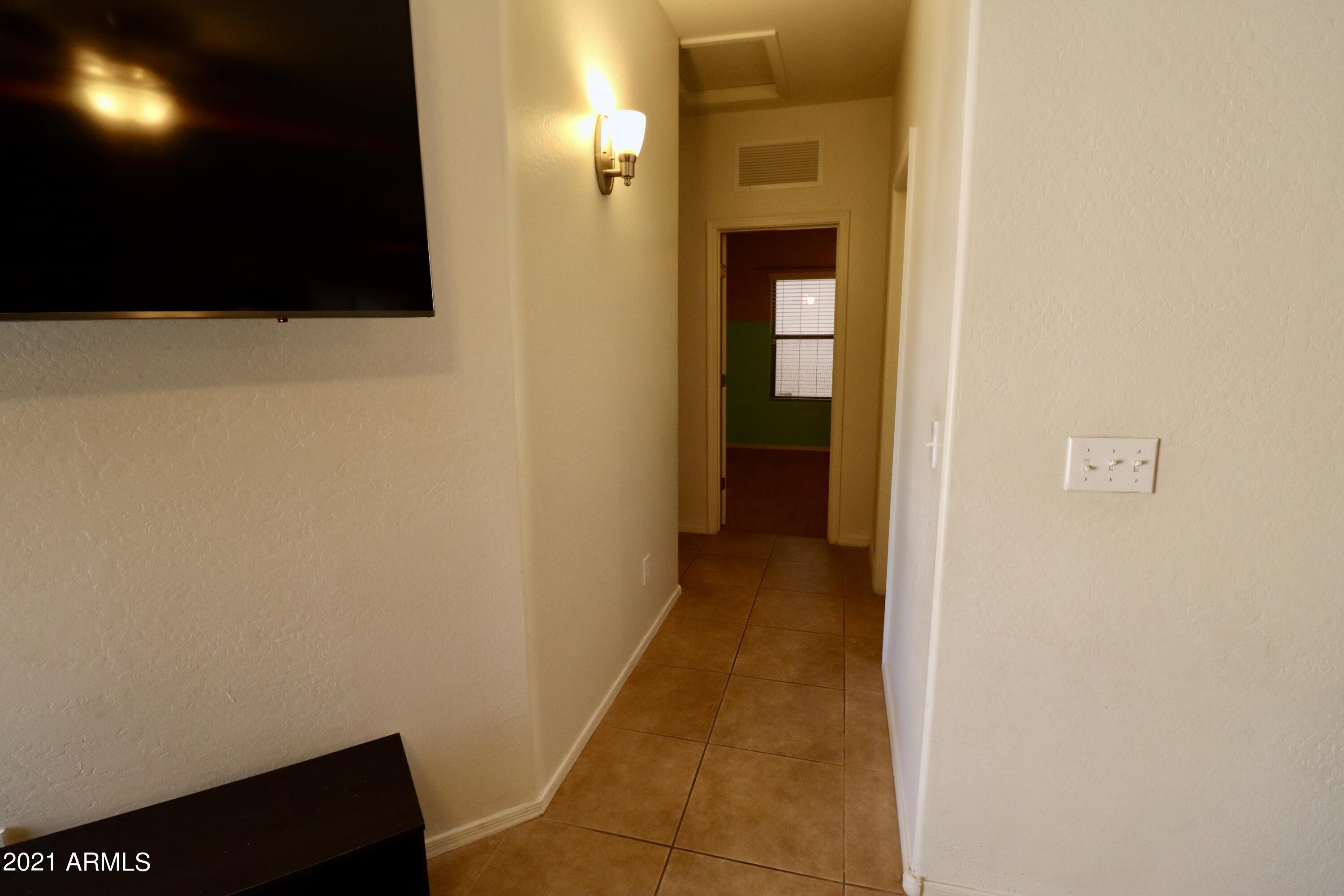 9223 West Belvoir Road Phoenix, AZ 85037 - Photo 13 of 25 2nd Hallway from Fam Rm