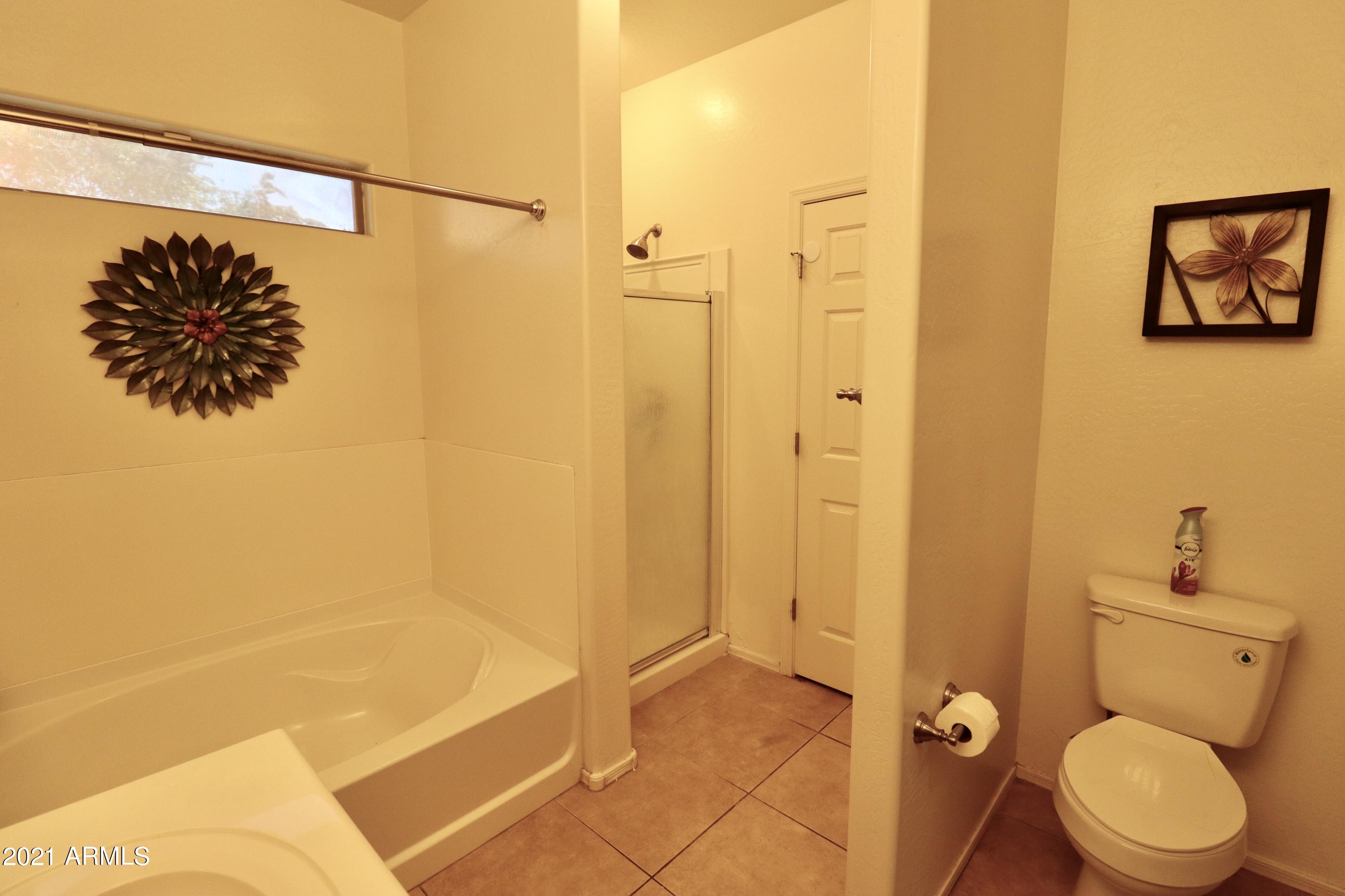 9223 West Belvoir Road Phoenix, AZ 85037 - Photo 17 of 25 Mater Bath Shower