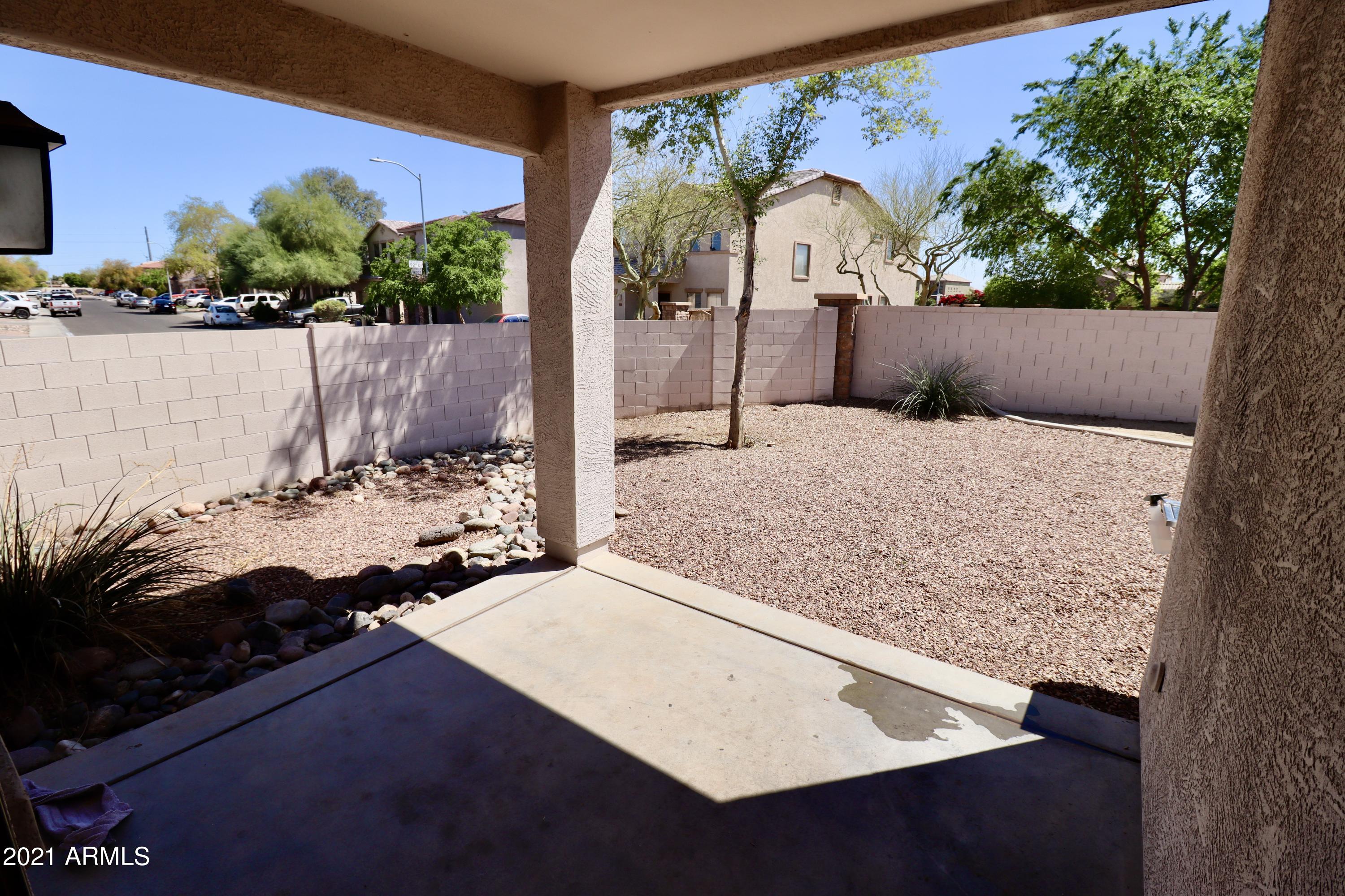 9223 West Belvoir Road Phoenix, AZ 85037 - Photo 20 of 25 Back Porch from Sliding door