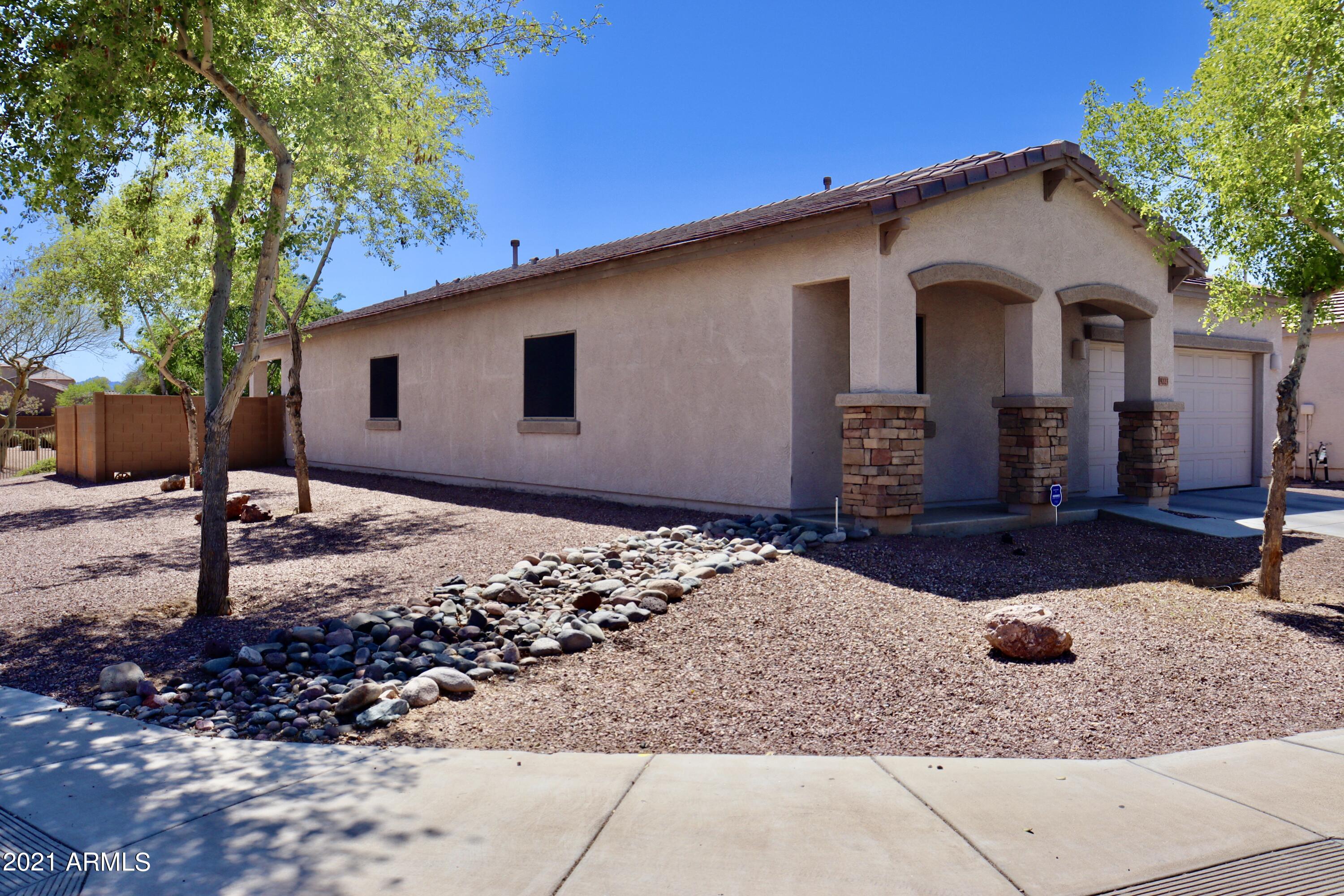 9223 West Belvoir Road Phoenix, AZ 85037 - Photo 2 of 25 Front.Side of House