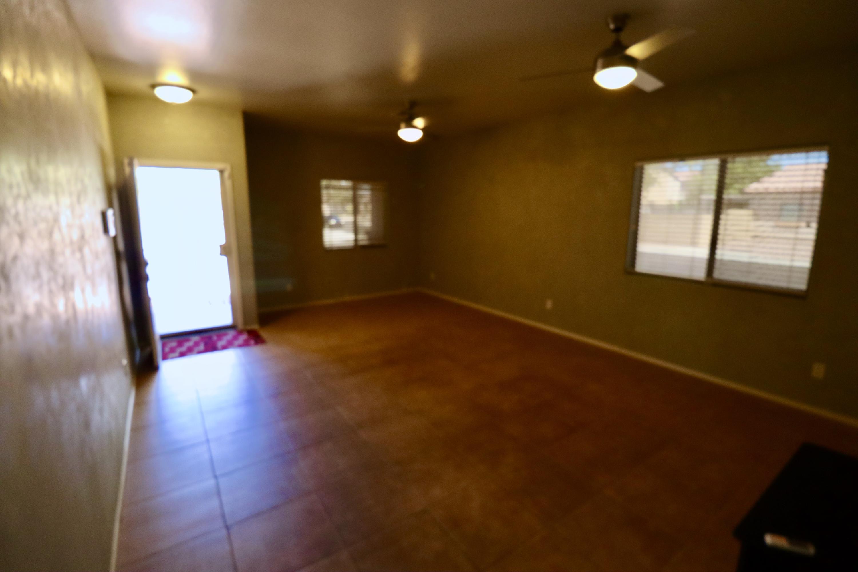 9223 West Belvoir Road Phoenix, AZ 85037 - Photo 5 of 25 Front Rm Outside