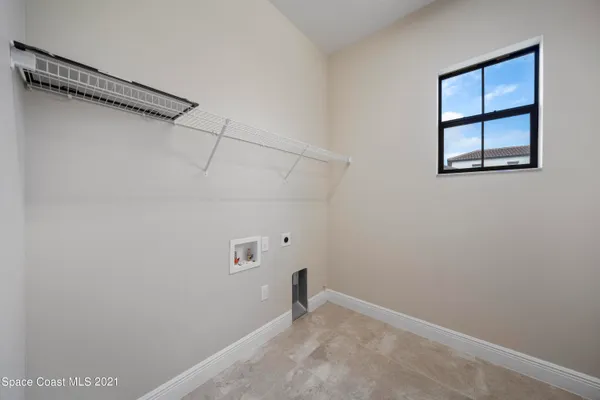 a view of a room with racks on the wall