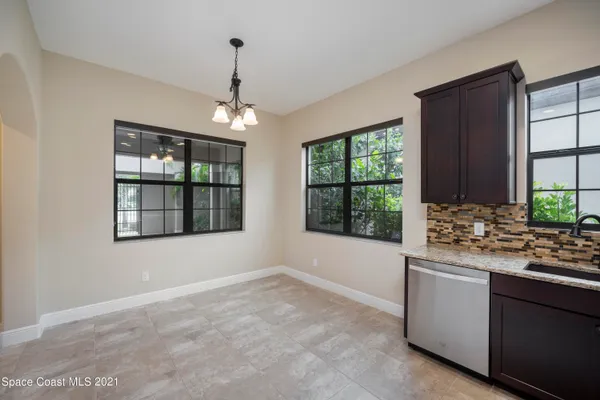 a kitchen with a stove a sink and dishwasher