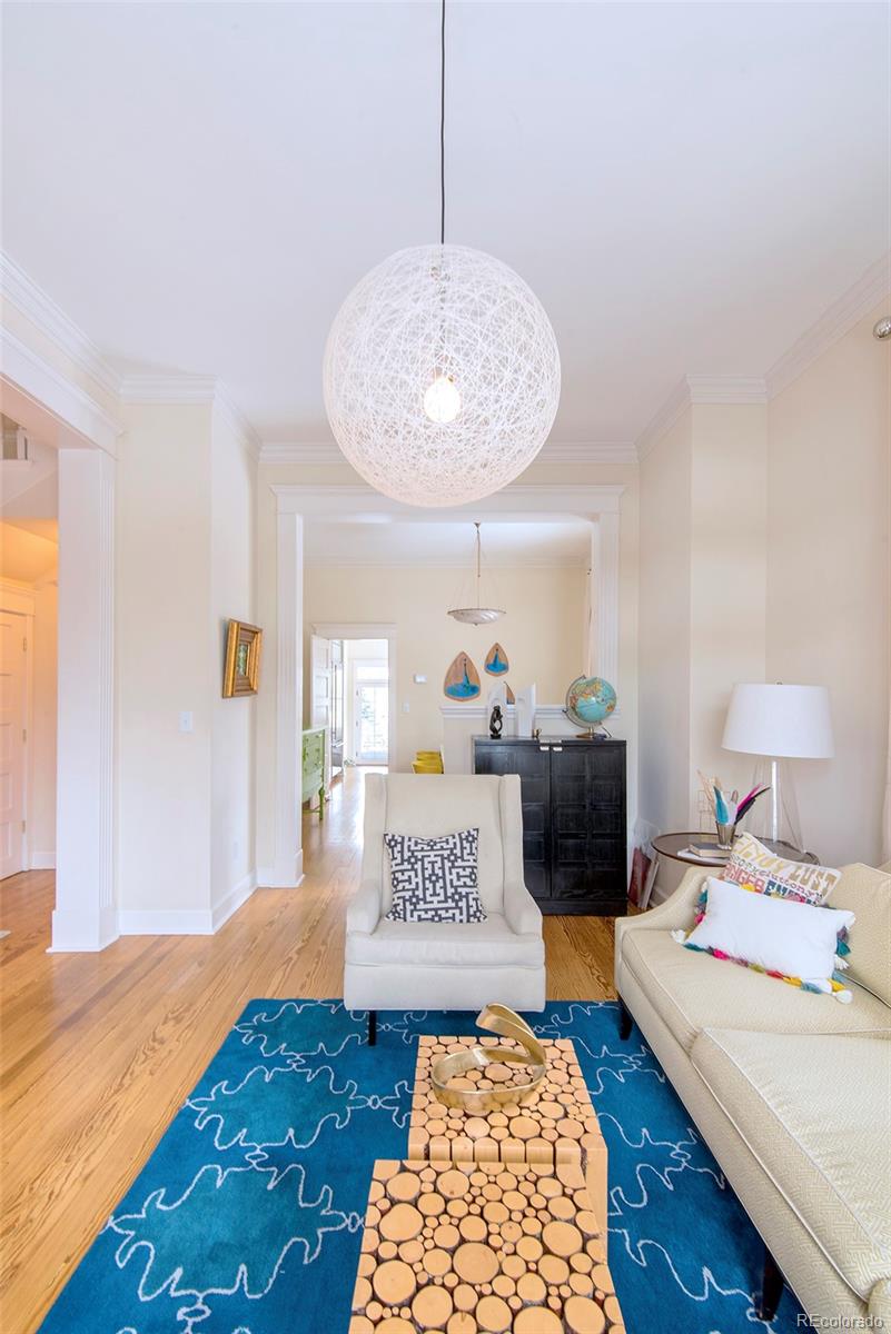 2137 Pine Street Boulder, CO 80302 - Photo 13 of 40 a view of a bedroom with bed and dresser