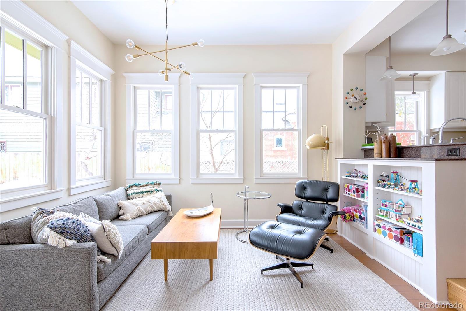 2137 Pine Street Boulder, CO 80302 - Photo 19 of 40 a living room with furniture and a large window