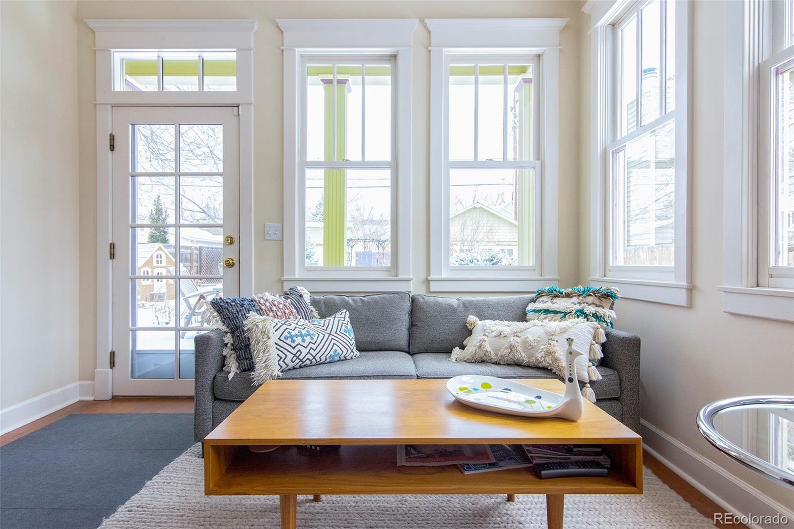 2137 Pine Street Boulder, CO 80302 - Photo 20 of 40 a living room with furniture and a window
