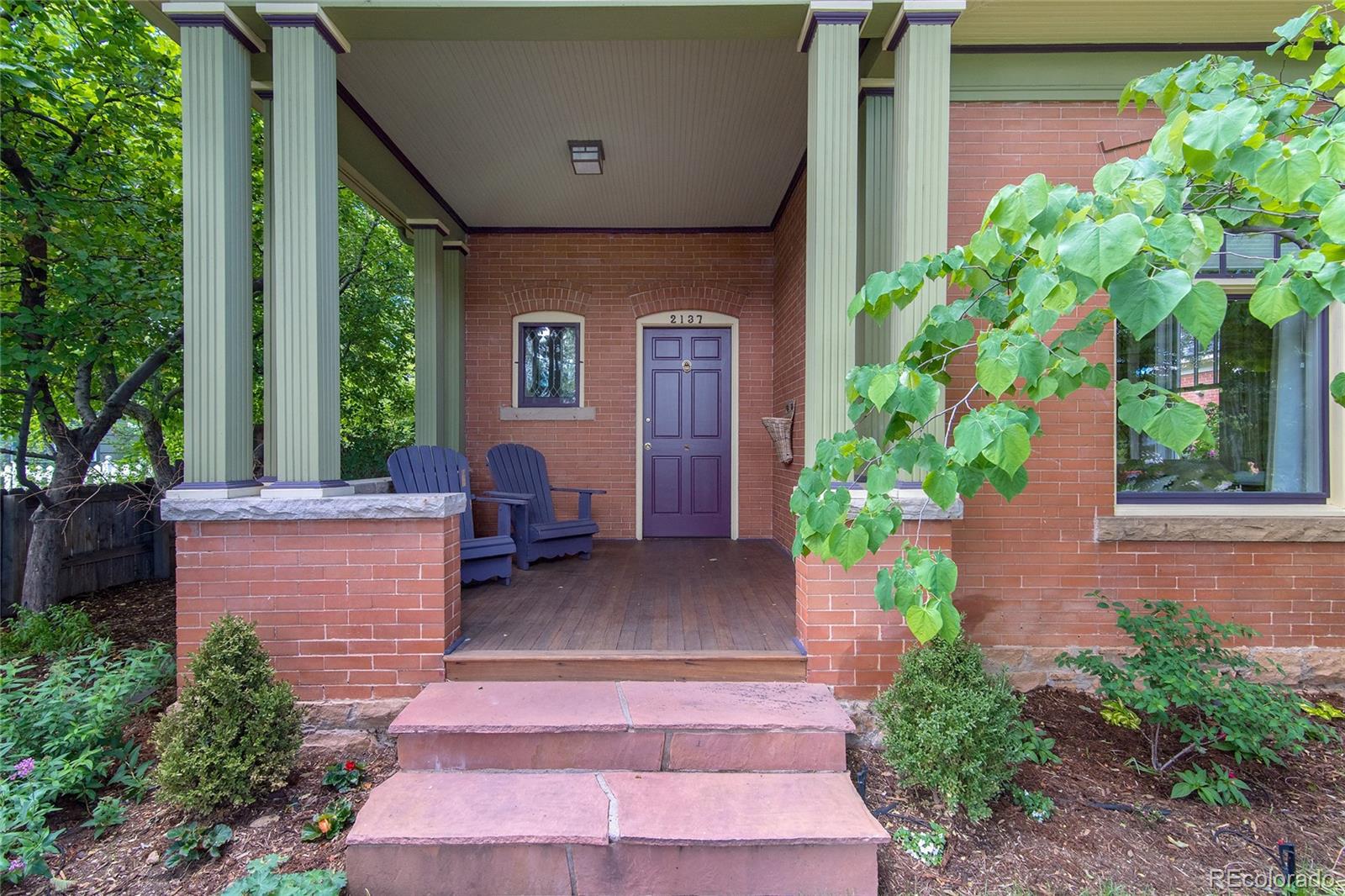 2137 Pine Street Boulder, CO 80302 - Photo 2 of 40 a front view of a house with garden