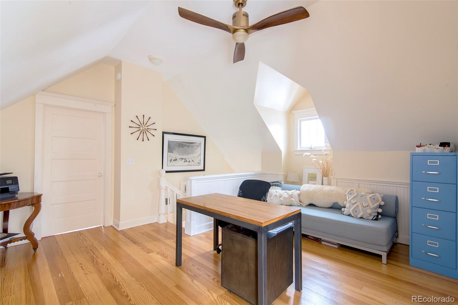 2137 Pine Street Boulder, CO 80302 - Photo 28 of 40 a living room with furniture and a table