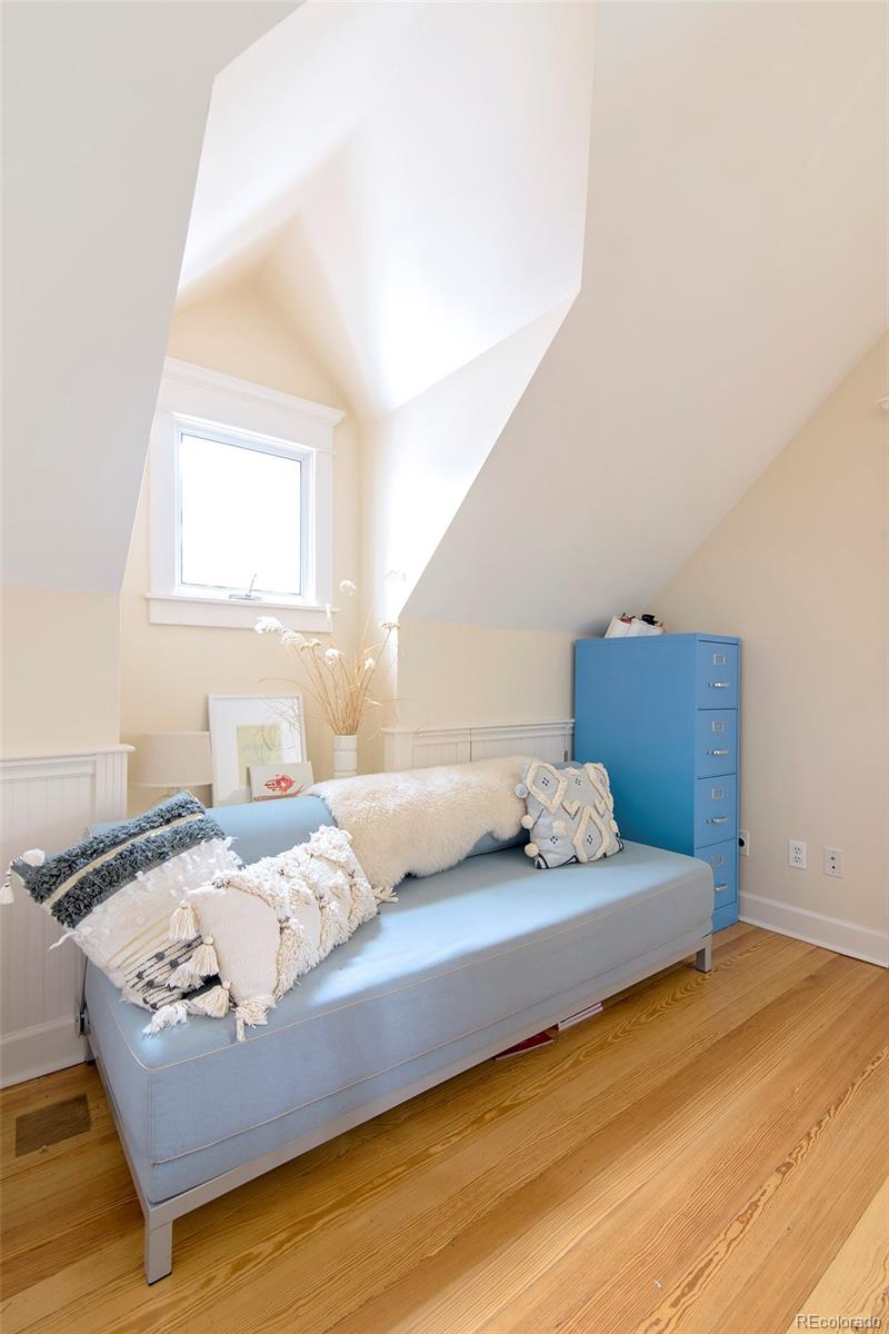 2137 Pine Street Boulder, CO 80302 - Photo 29 of 40 a bedroom with a bed and couch