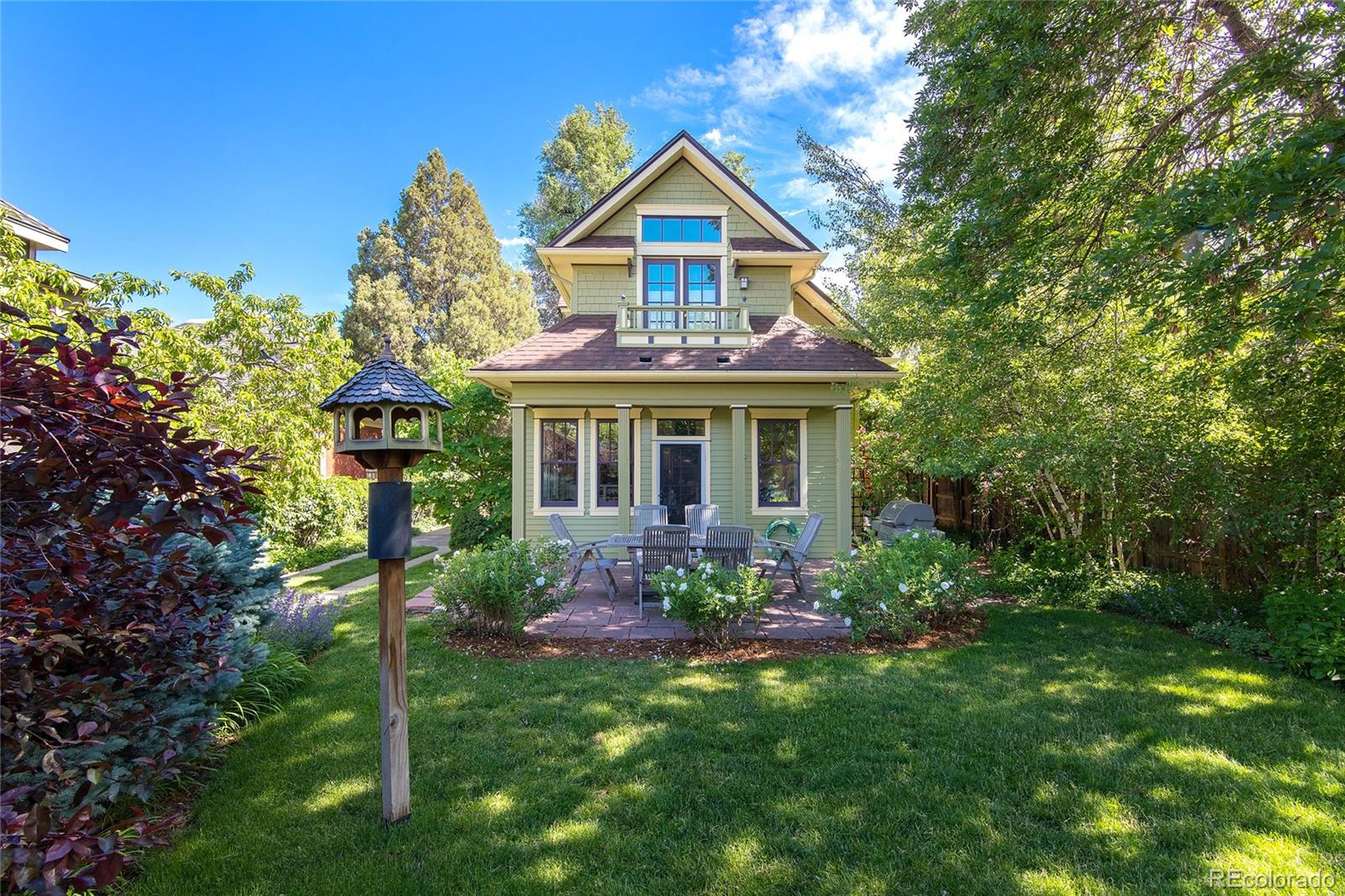 2137 Pine Street Boulder, CO 80302 - Photo 3 of 40 a front view of a house with a yard