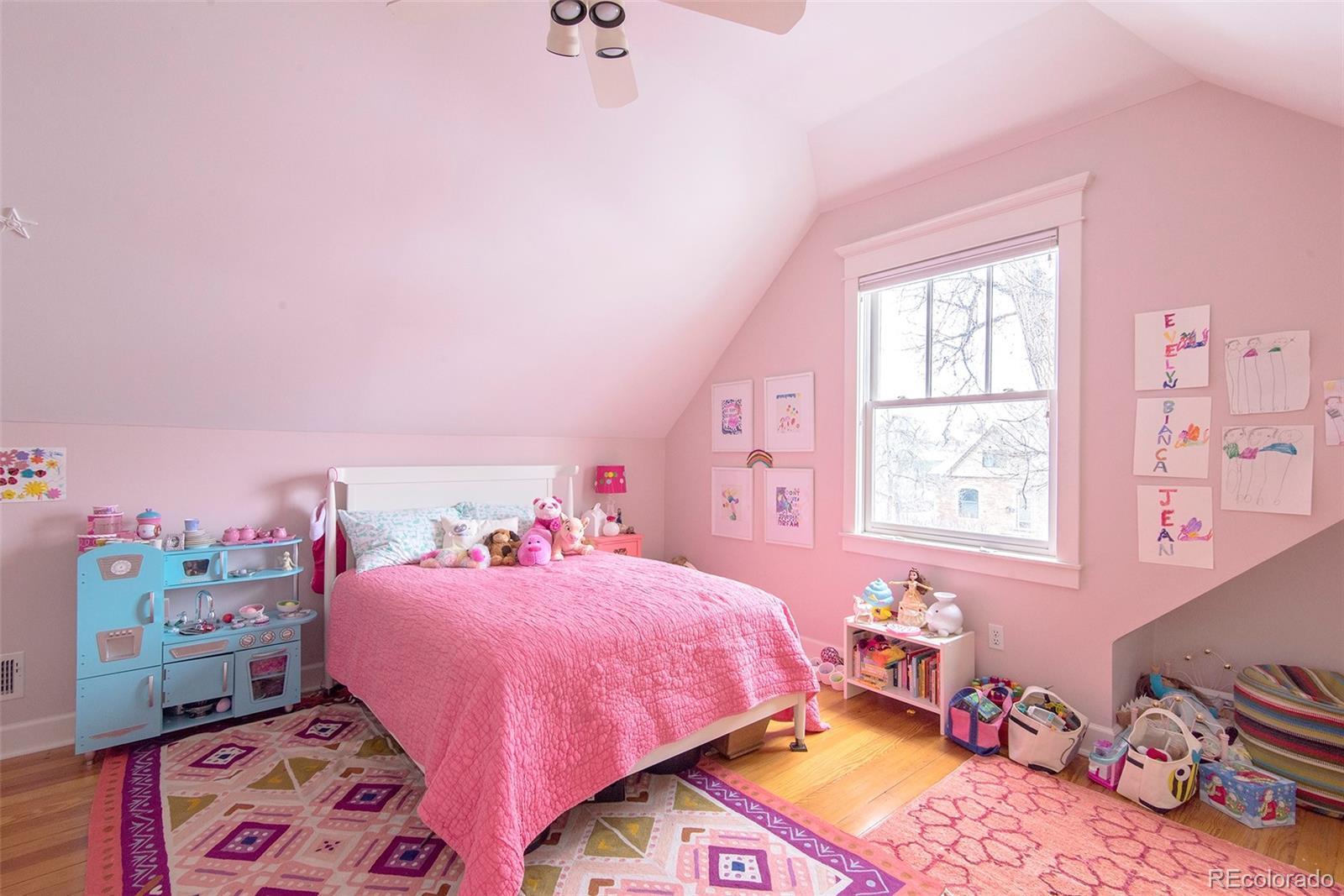2137 Pine Street Boulder, CO 80302 - Photo 34 of 40 a bedroom with a bed a dresser and a window