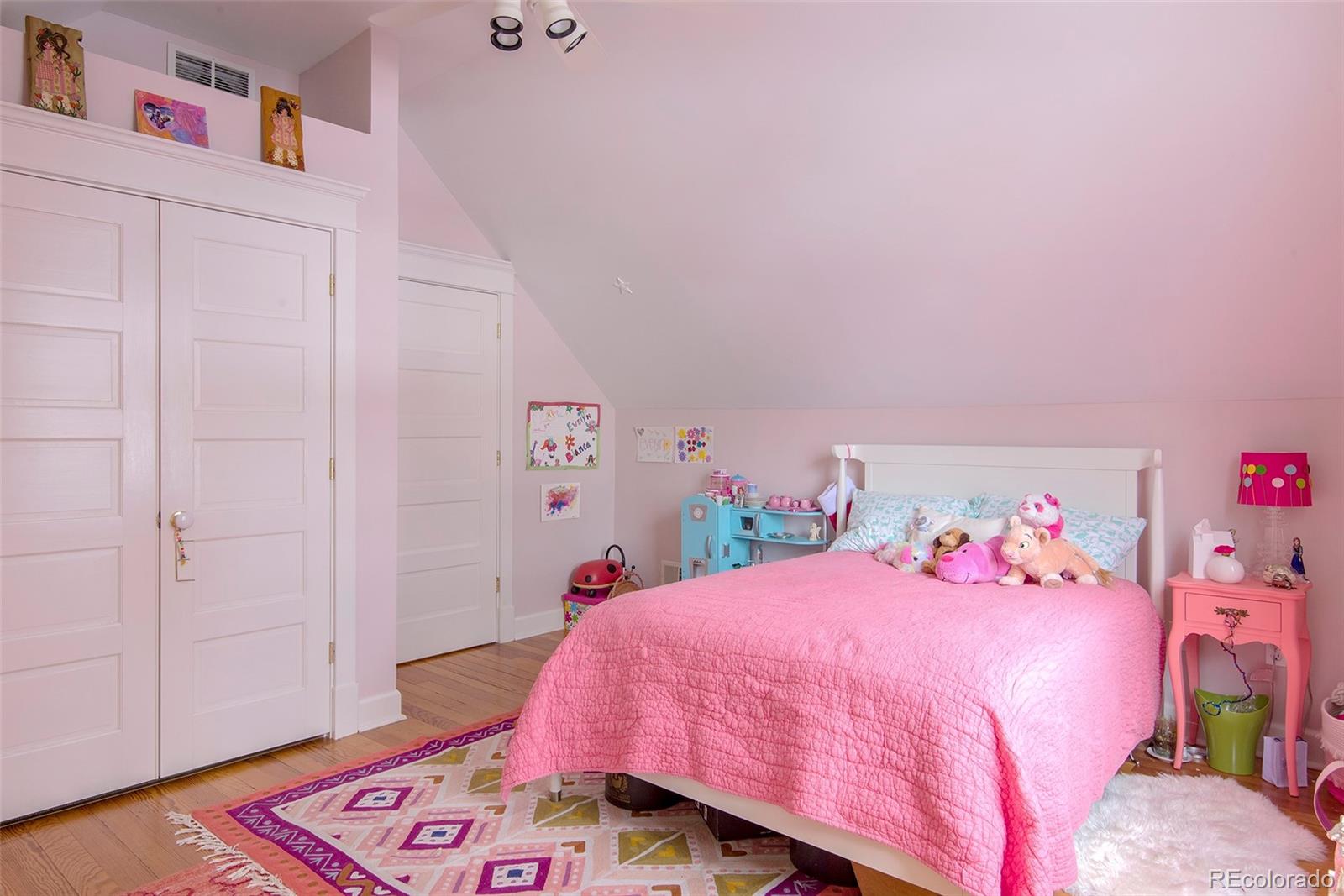 2137 Pine Street Boulder, CO 80302 - Photo 35 of 40 a bedroom with a bed and a closet