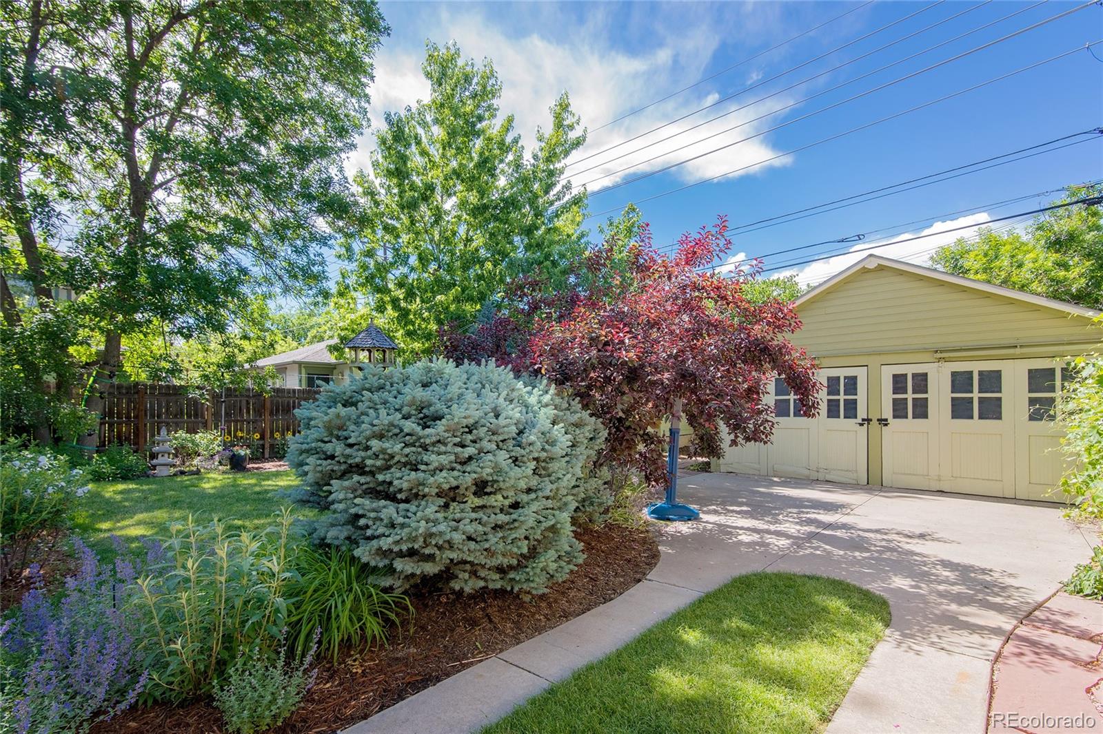 2137 Pine Street Boulder, CO 80302 - Photo 40 of 40 a front view of a house with a yard