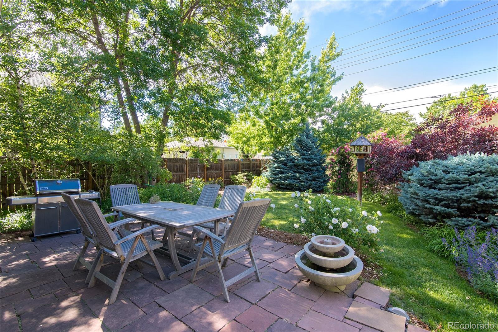 2137 Pine Street Boulder, CO 80302 - Photo 4 of 40 a view of a patio with table and chairs and potted plants
