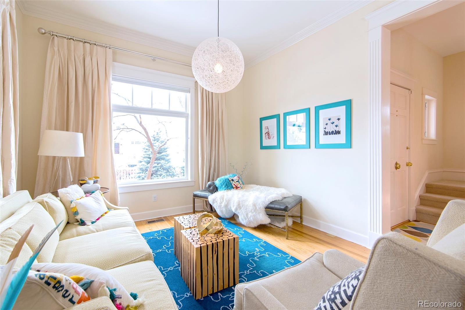 2137 Pine Street Boulder, CO 80302 - Photo 6 of 40 a bedroom with furniture and a large window