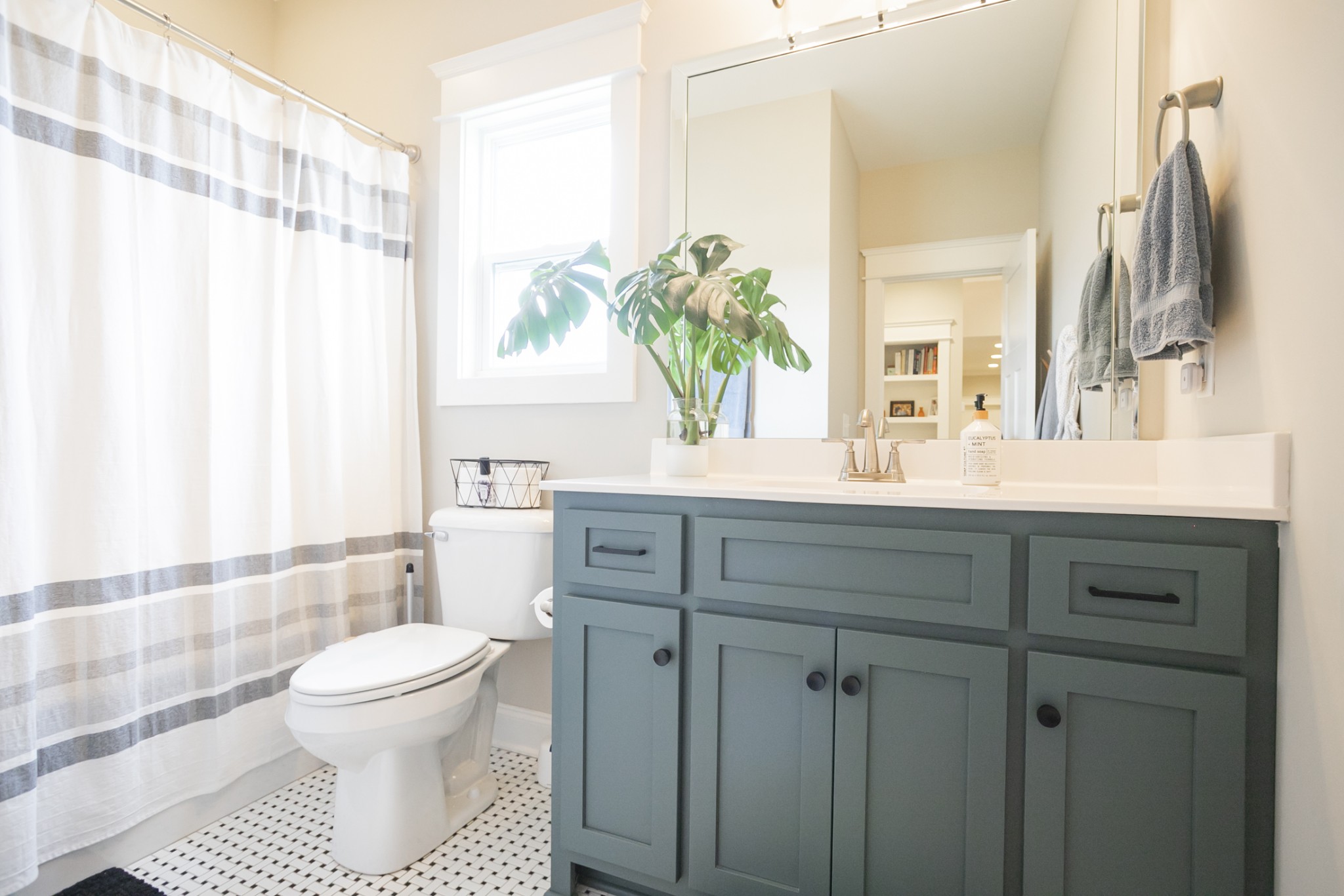 6599 Simmons Bluff Road Lebanon, TN 37090 - Photo 14 of 23 a bathroom with a sink a toilet and a mirror
