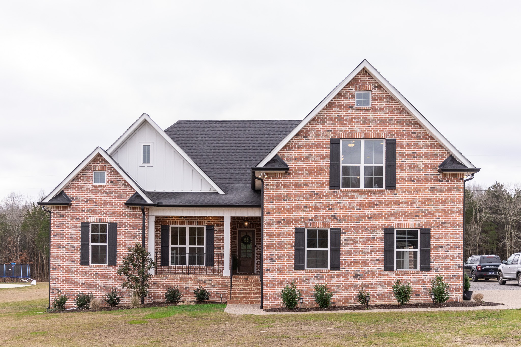 6599 Simmons Bluff Road Lebanon, TN 37090 - Photo 4 of 23 a front view of a house with a yard