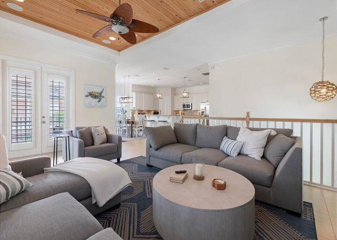503 Cinnamon Beach Lane Palm Coast, FL 32137 - Photo 11 of 50 a living room with furniture and a large window